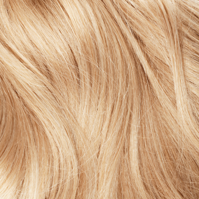 DIY hair extension kit by VELVEE hair offers tape in hair extensions in light strawberry blonde.