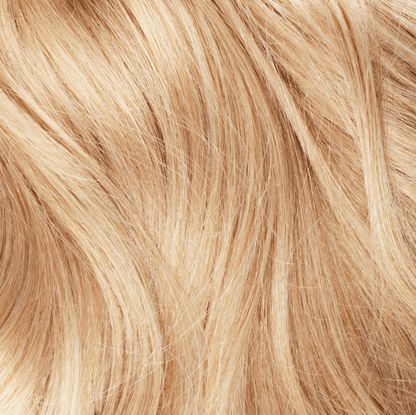 DIY hair extension kit by VELVEE hair offers tape in hair extensions in light strawberry blonde.